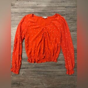 Reddish orange floral top